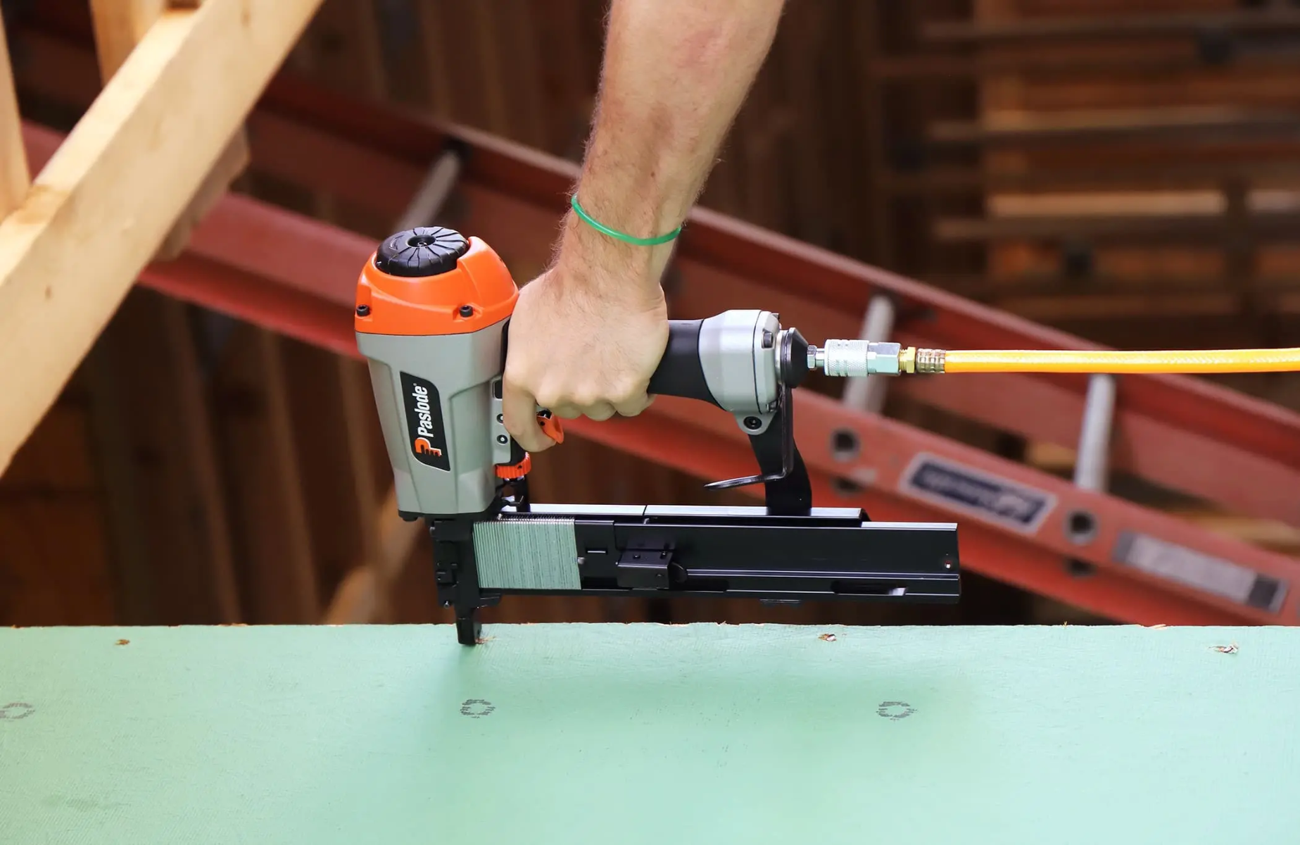 Paslode WCS200 16 Ga. Wide 15/16” Crown Pneumatic Stapler in use jobsite