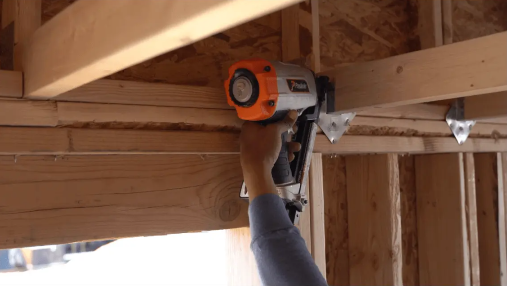Paslode F150S-PP Positive Placement Metal Connector Nailer, 1-1/2" in use