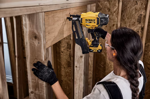 Dewalt DCN920B 20V MAX Cordless 21-Degree Framing Nailer in use on jobsite