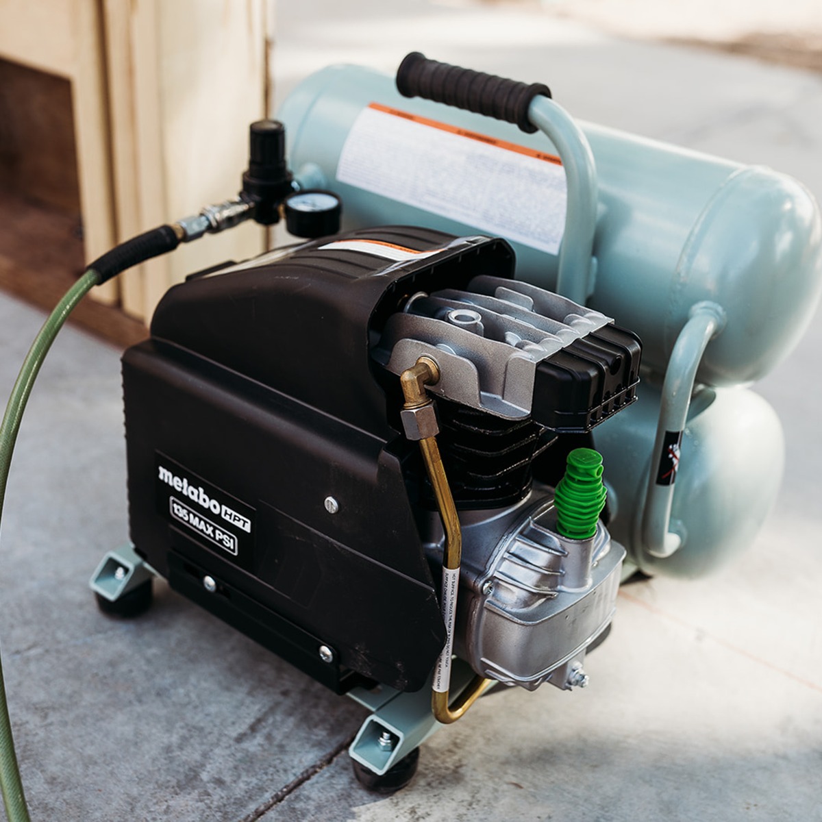 Metabo HPT EC99S 4 Gallon Portable Electric Twin Stack Air Compressor in use 2