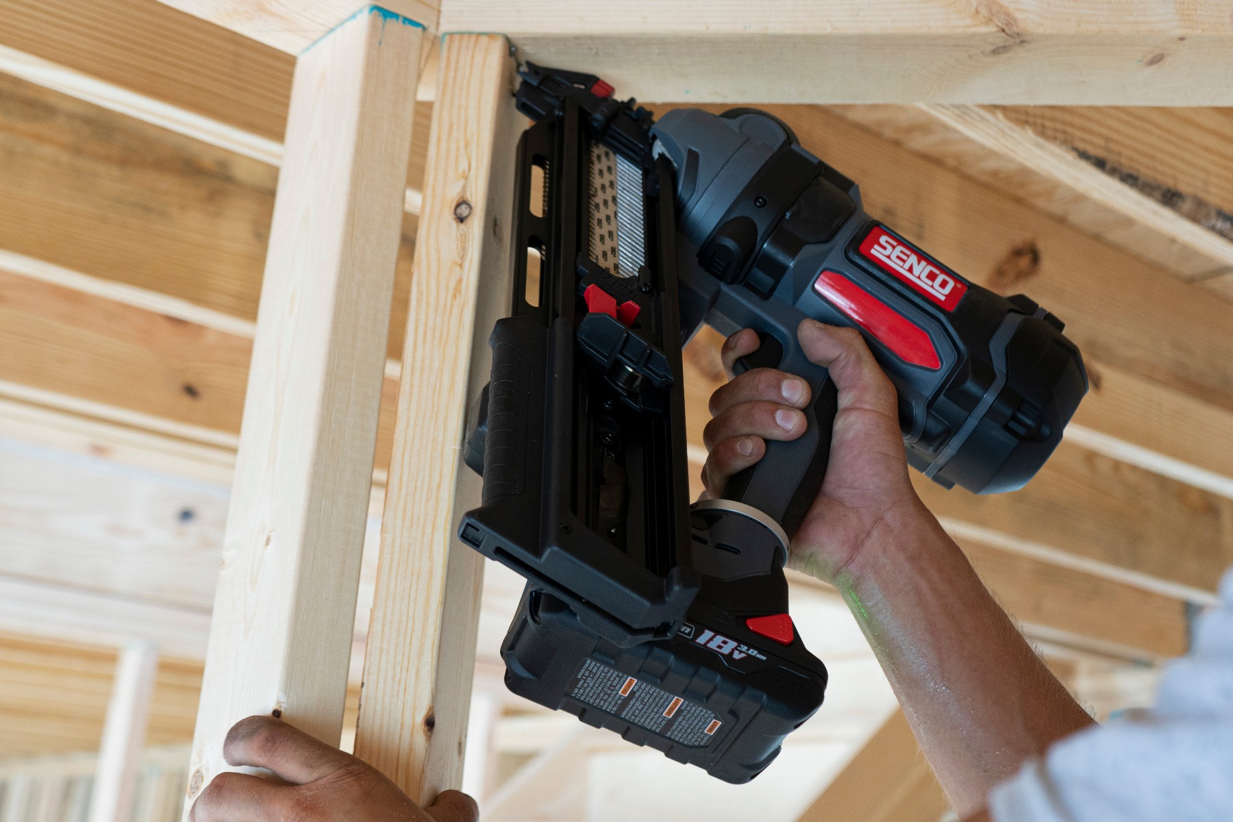 Senco Fusion F-35XP Paper-Tape Cordless Framing Nailer environmental in use jobsite