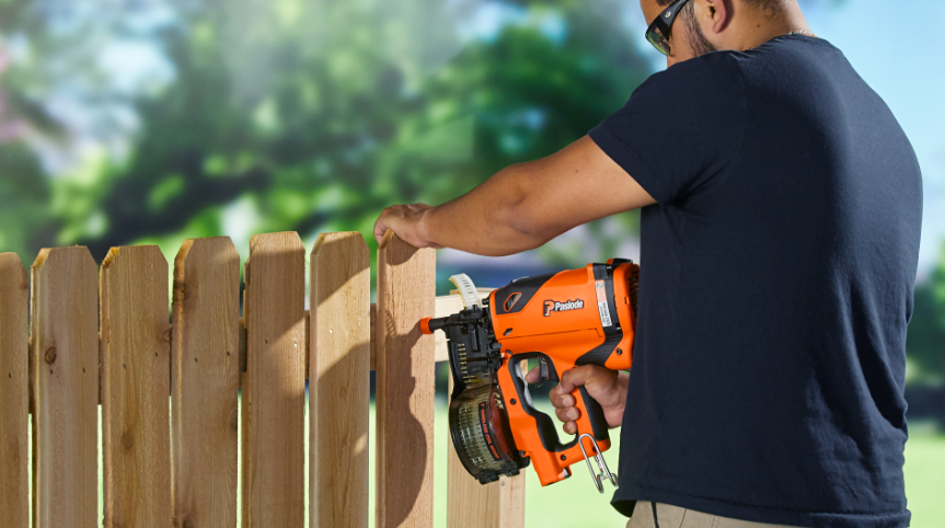 Paslode CSF 919100 Coil Siding & Fencing Nailer in use building fence