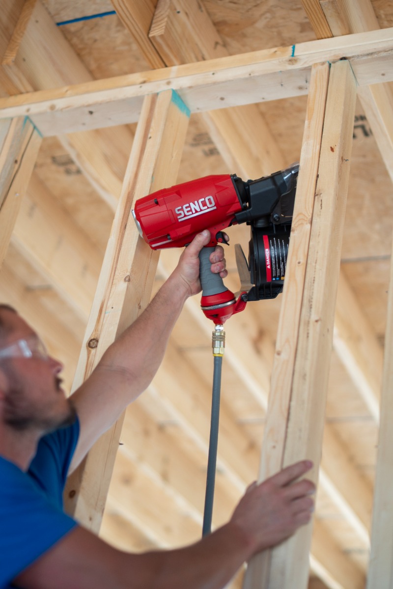 Senco FN71T1 15 Degree Coil Framing Nailer in use jobsite