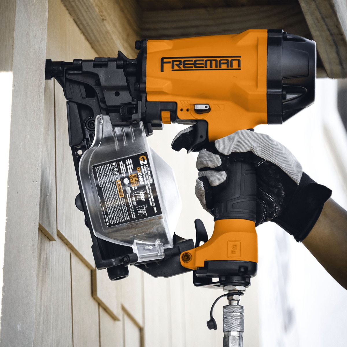Freeman G2CN65 Pneumatic 15-Degree Coil Siding Nailer, 1-1/4” – 2-1/2” in use