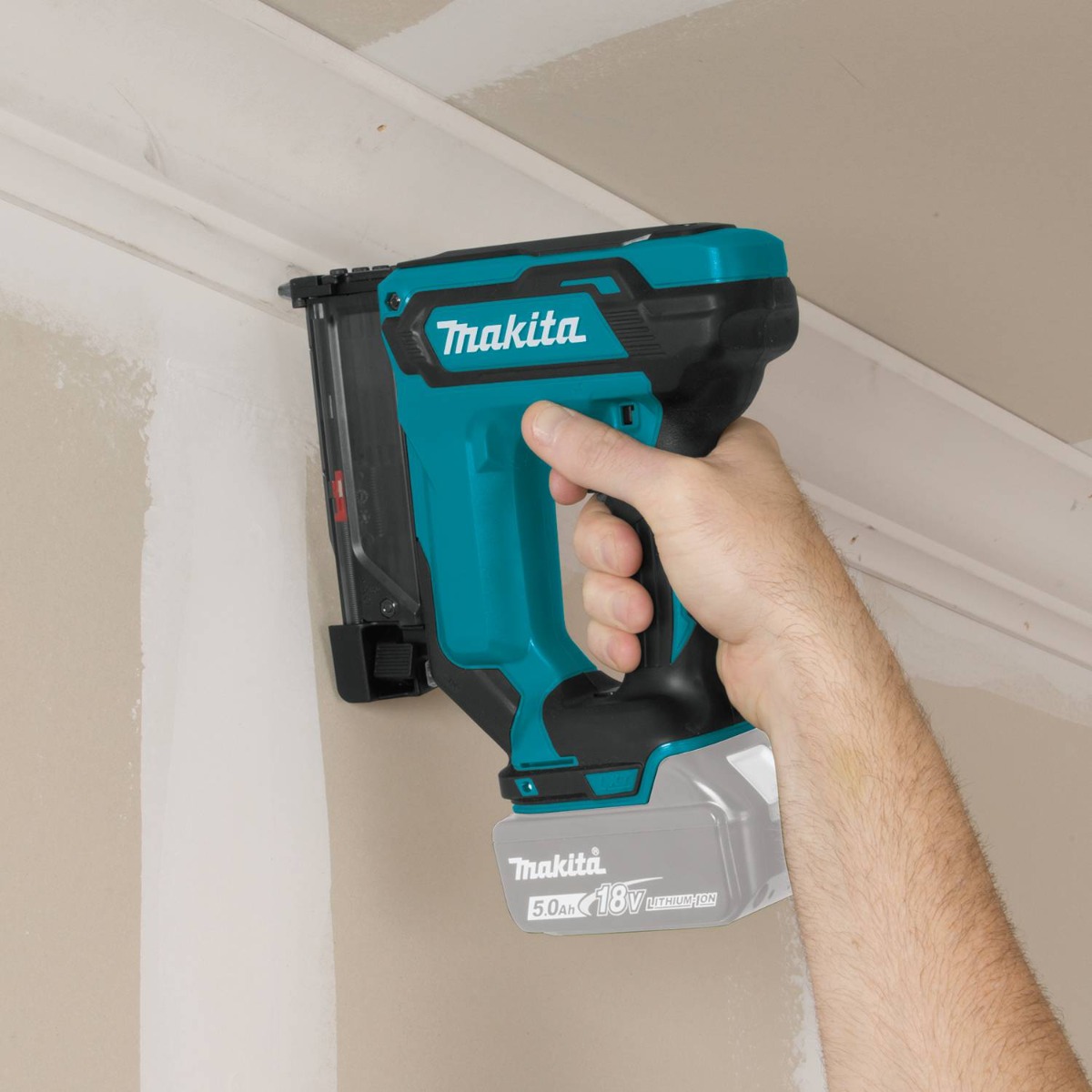 Makita XTP02Z 18V LXT Cordless 23 Gauge Pin Nailer in use