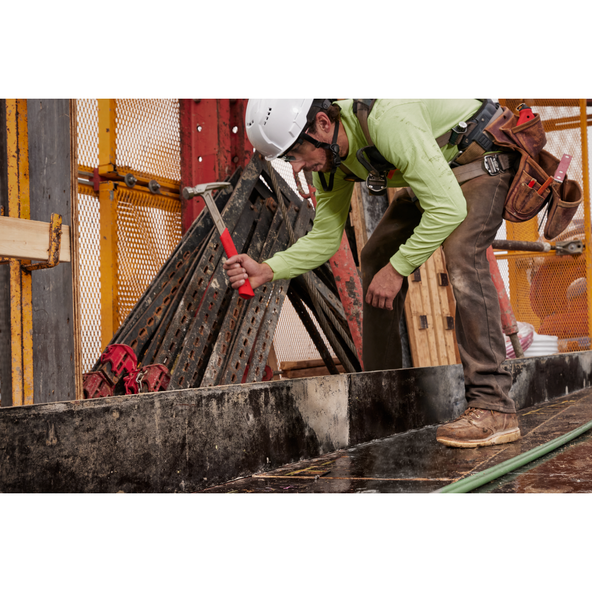 16D 3” x .131 Collated Duplex Nails in use on construction site