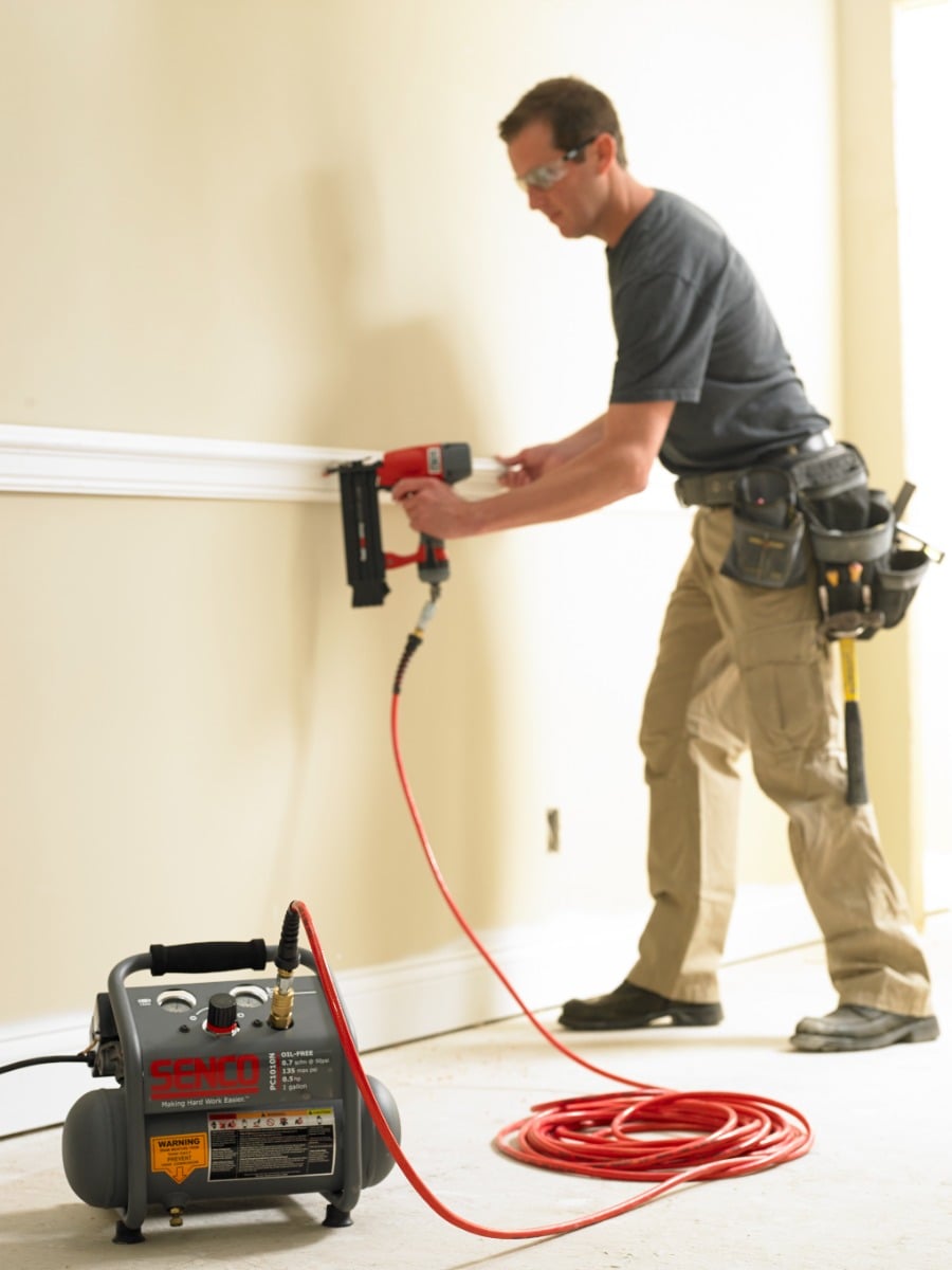 Senco PC1010N Portable Electric Air Compressor in use