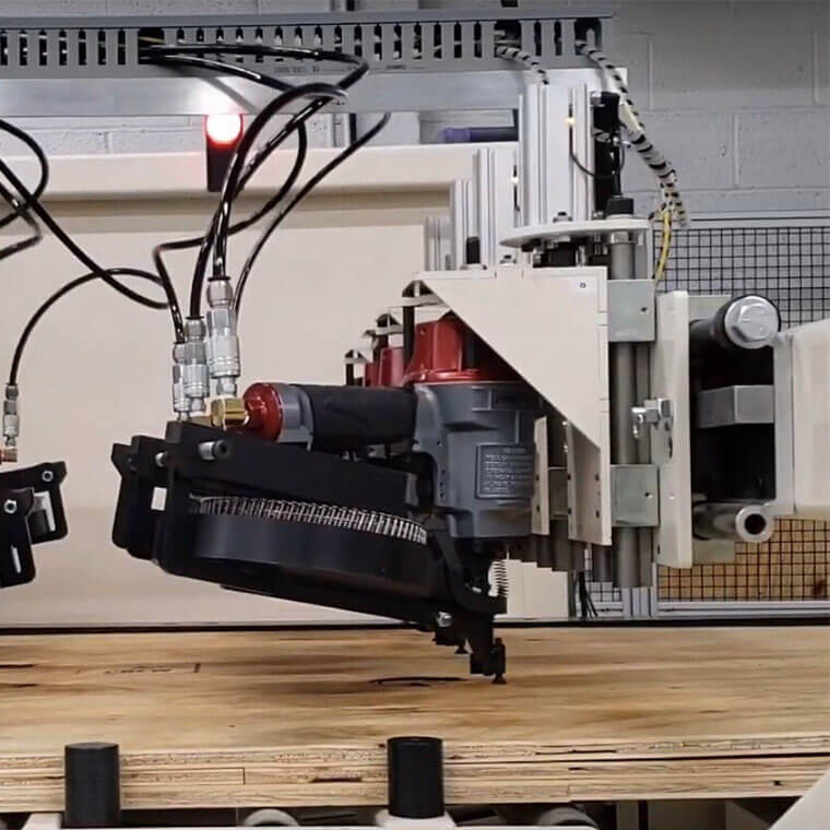 Everwin PN90PAL Machine Mounted Wire Coil Nailer in use 1