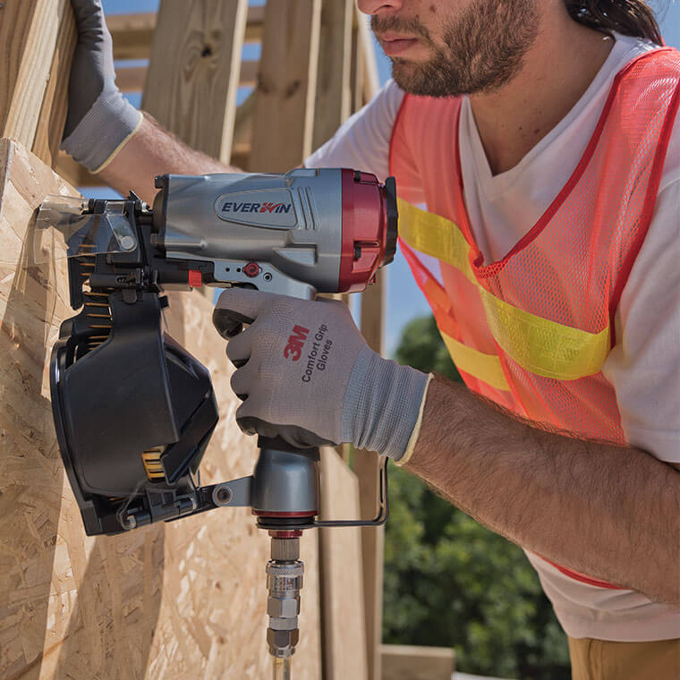 Everwin SCN51 Siding Coil Nailer, 1" - 2" in use
