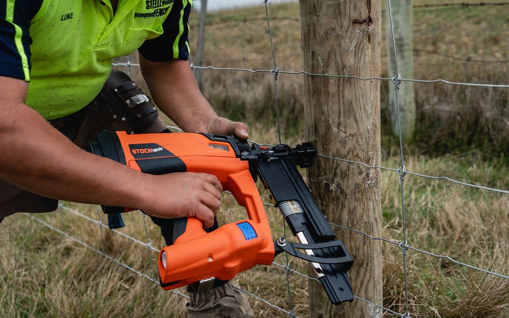STOCKade ST400i Cordless Fencing Stapler in use