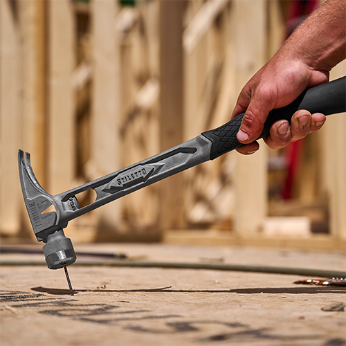 Stiletto TIBONE 15oz Milled Face, Curved Handle Framing Hammer in use jobsite