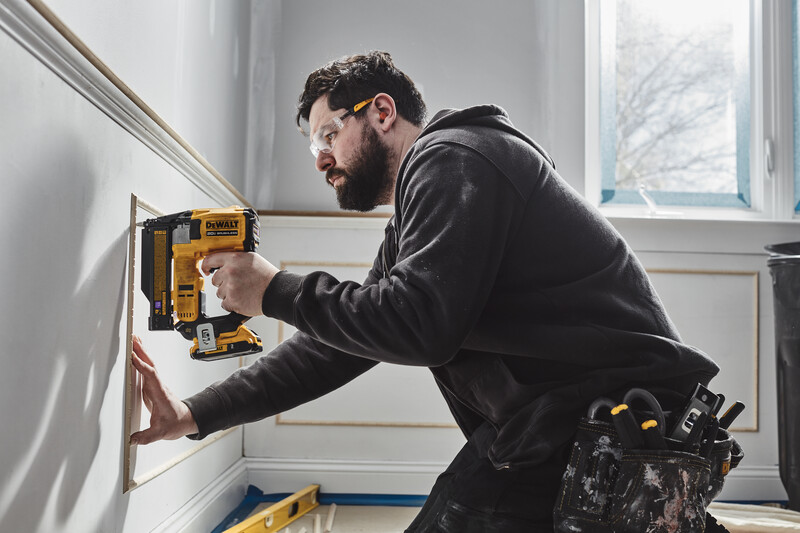 DeWalt DCN623D1 20V MAX 23 Gauge Pin Nailer 5/8" to 1-1/2" with battery pack in use