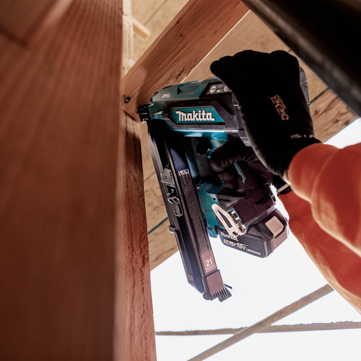 Makita XNB03M1 18V LXT Brushless 21-Degree Full Round Head Framing Nailer Kit in use construction site